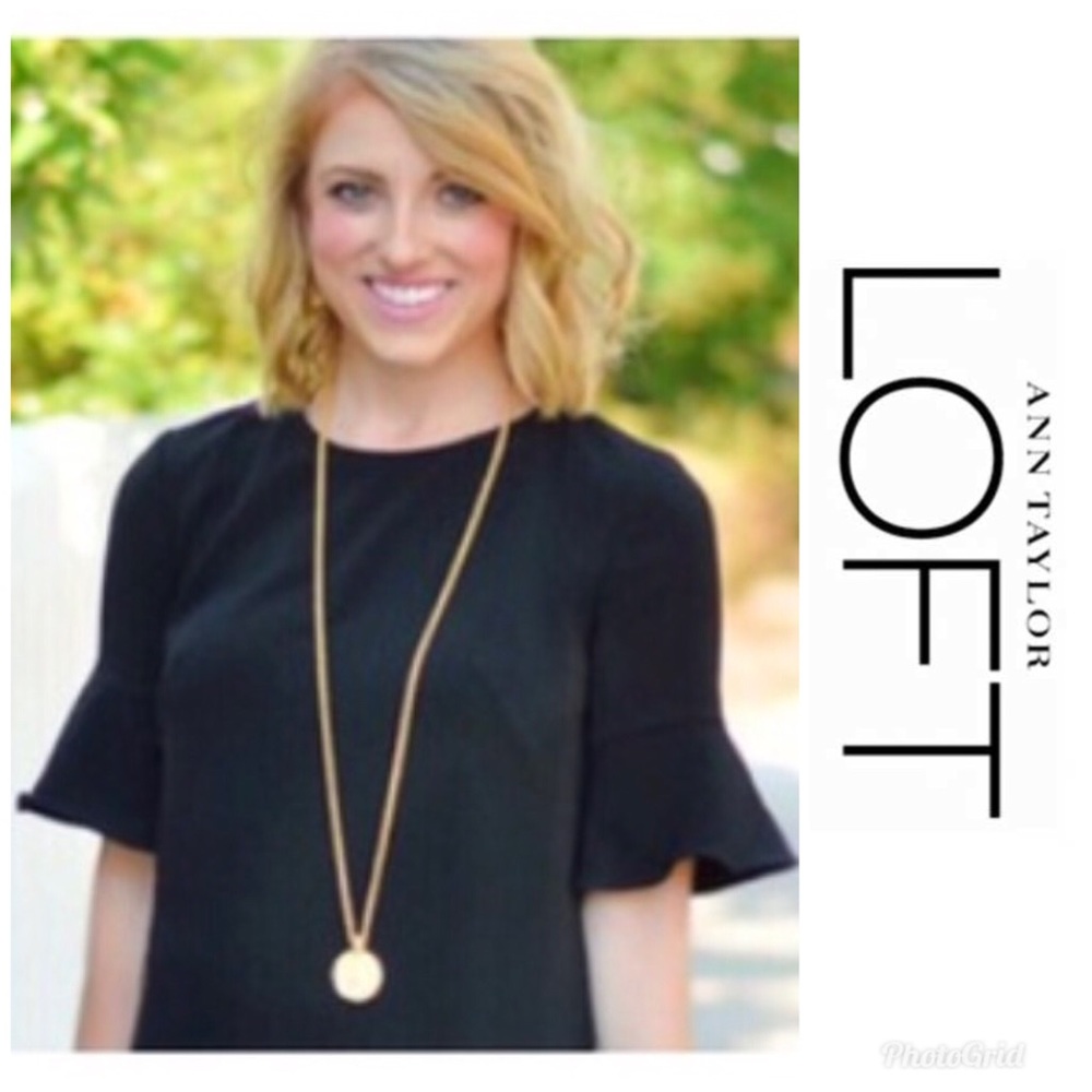 Black shirt with flared sleeves